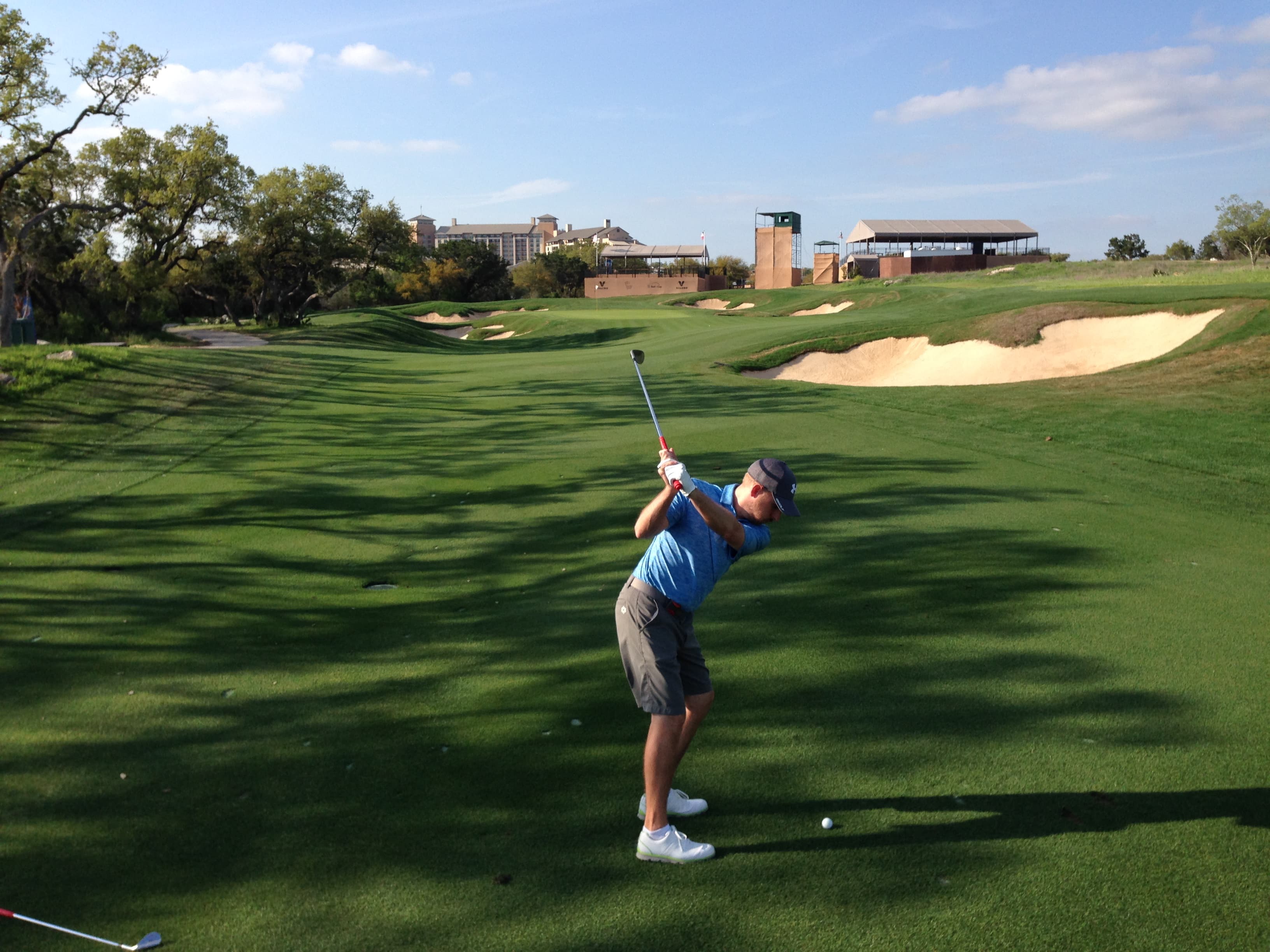 Golfer hitting an approach shot